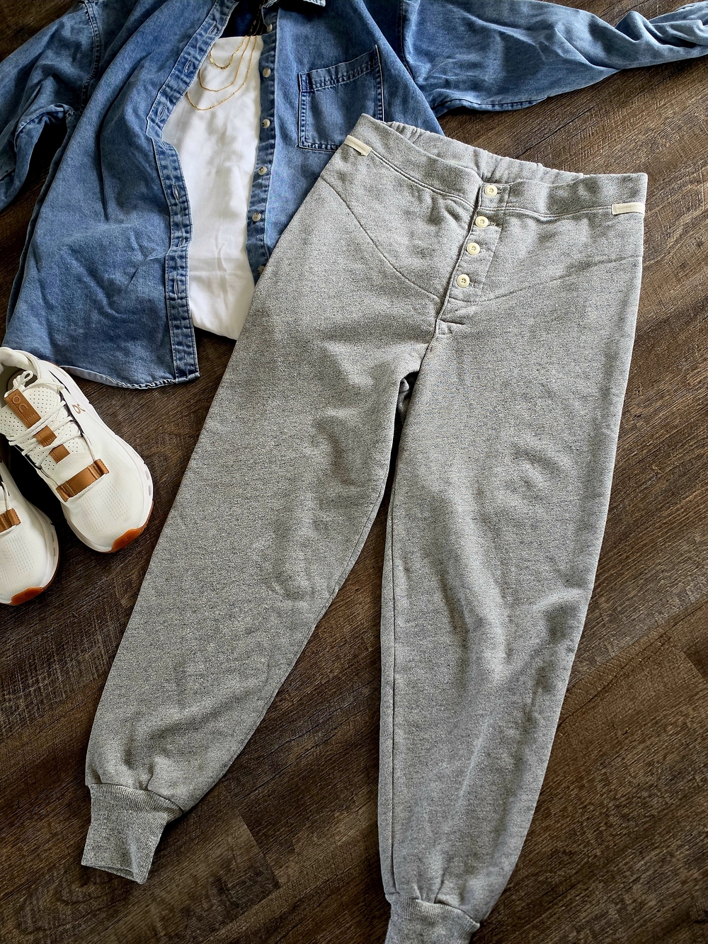 THE GREAT. Heather Grey High-Waist Joggers with Button Detail